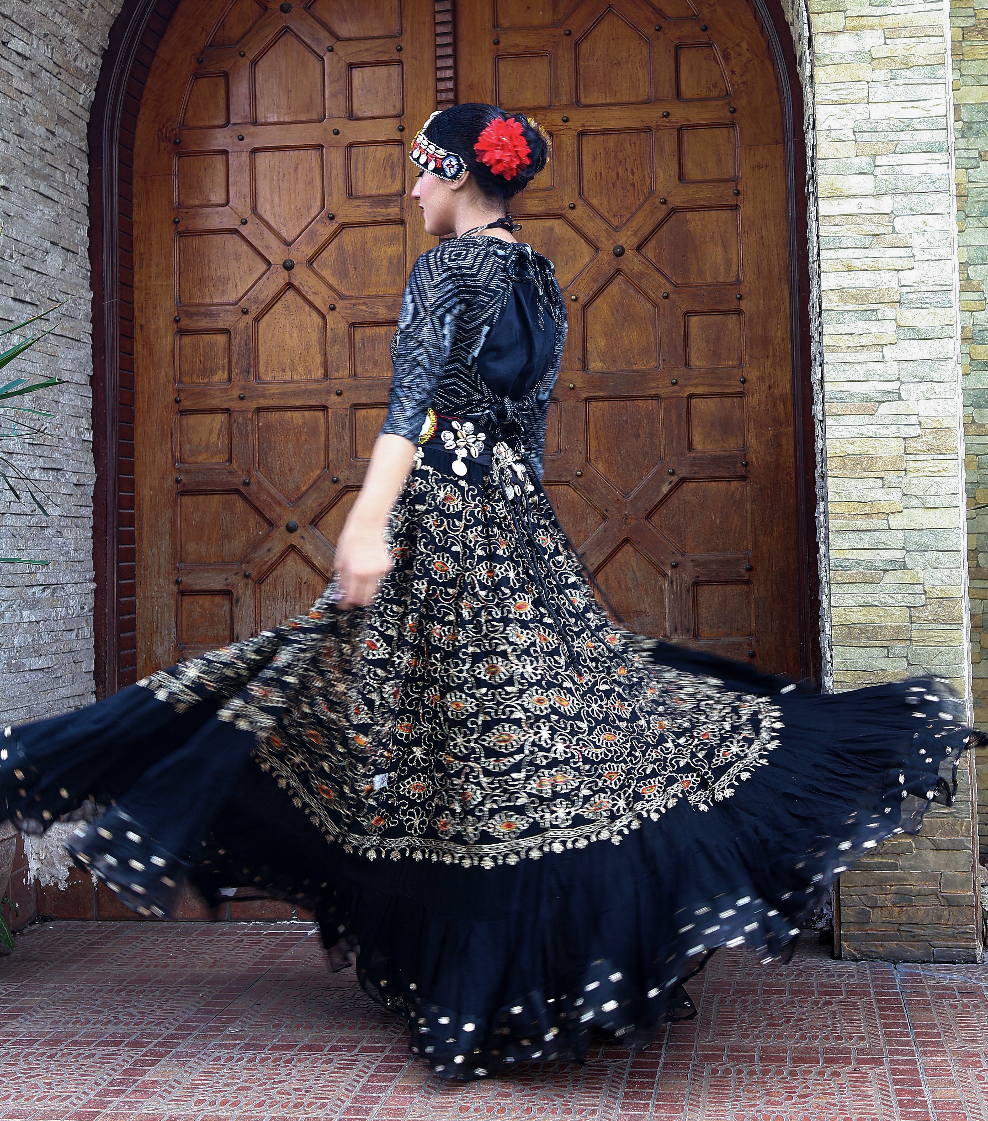 Black embroidery skirt with gold bindi border